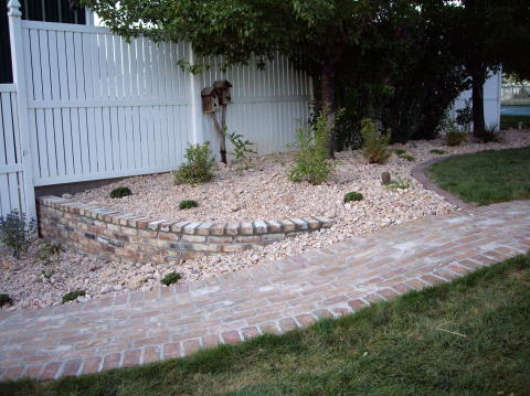 small retention wall with a brick finish