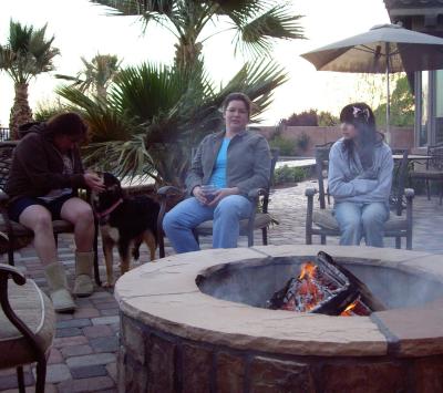 friends hangin out by the fire