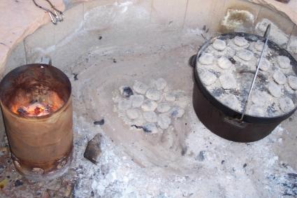 dutch oven cooking in fire pit