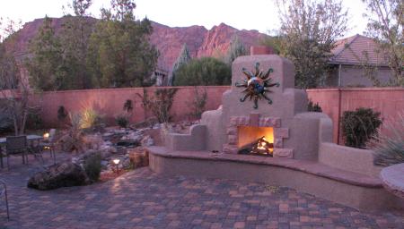 patio with outdoor fireplace